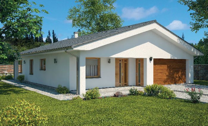 Projekt domu z 2-stan. garażem, 3 sypialnie i pralnia. Obszerny salon połączony z kuchnią, jadalnią oraz wyjściem na zadaszony taras.